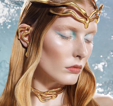 corona a forma organica in oro