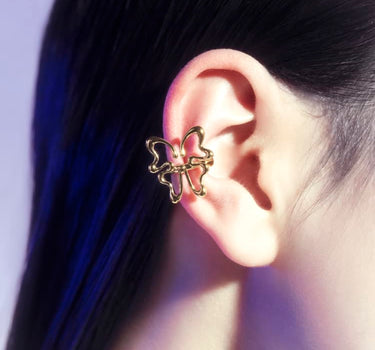 Ear cuff a scatto in oro con farfalla