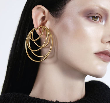 Ear cuff a cerchio in oro con molte spire