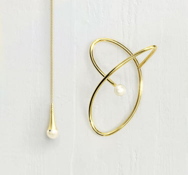 Ear cuff in oro con perla e catena