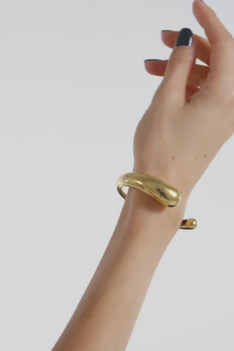 Bracciale rigido torque in oro