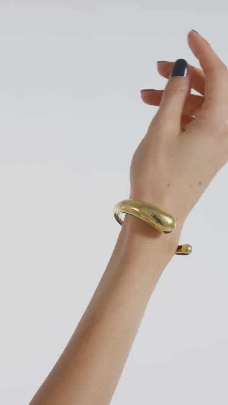 Bracciale rigido torque in oro