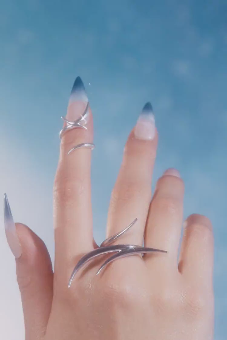 Anello lungo con punte in argento